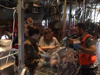 Le operazioni di imbarco sugli aerei dell'Aeronautica Militare