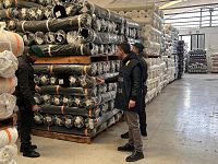 Parte dei tessuti posti sotto sequestro dalla guardia di finanza