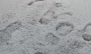 groupel o neve tonda
