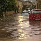 Allagamenti e fulmini, strade come fiumi