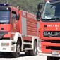 Fiamme nella vegetazione vicino a Fabbrica